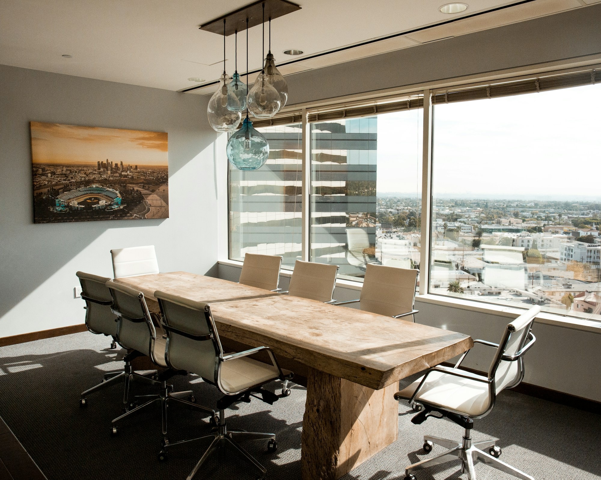 Boardroom with meeting table and city view